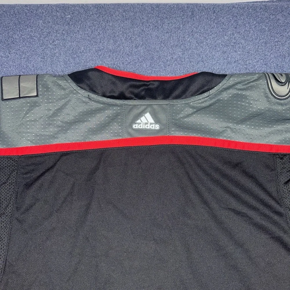 Carolina Hurricanes Adidas PrimeGreen MiC Authentic Black Flag Jersey - 52